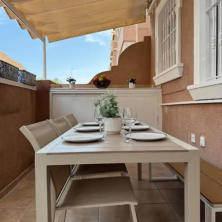 Дом отдыха Luminoso Adosado Con Terraza, Bbq Y Piscina Junto Al Mar Санта Пола